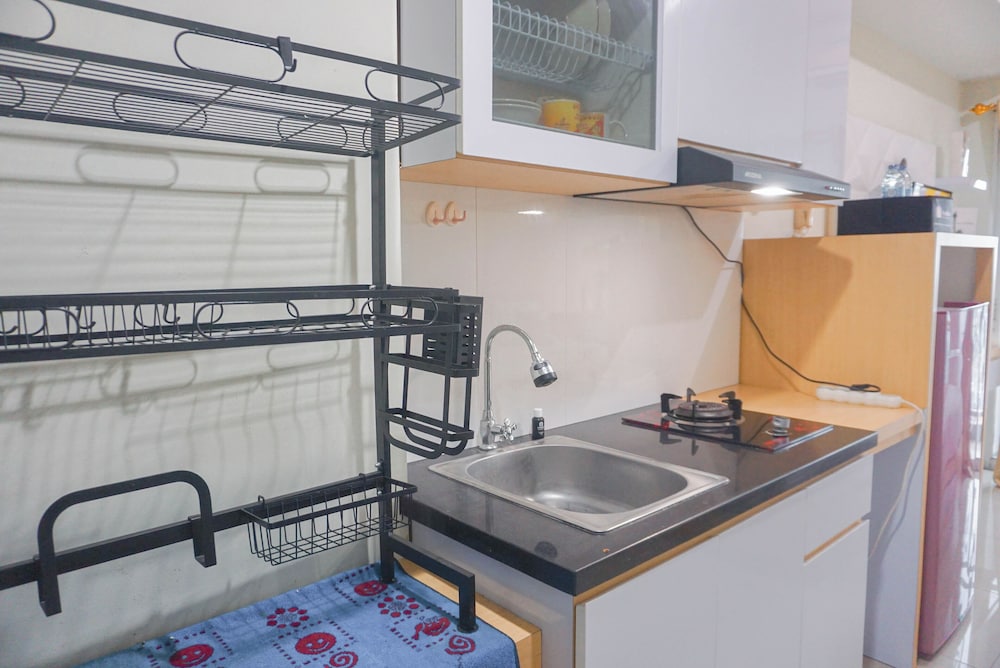 Cozy Stay and Strategic Studio Apartment at Grand Dhika City
