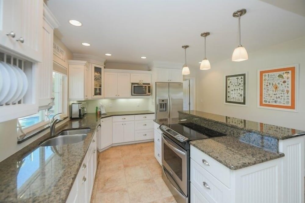 203 Periwinkle - Pretty Palms 4 Bedroom Home by RedAwning view 5