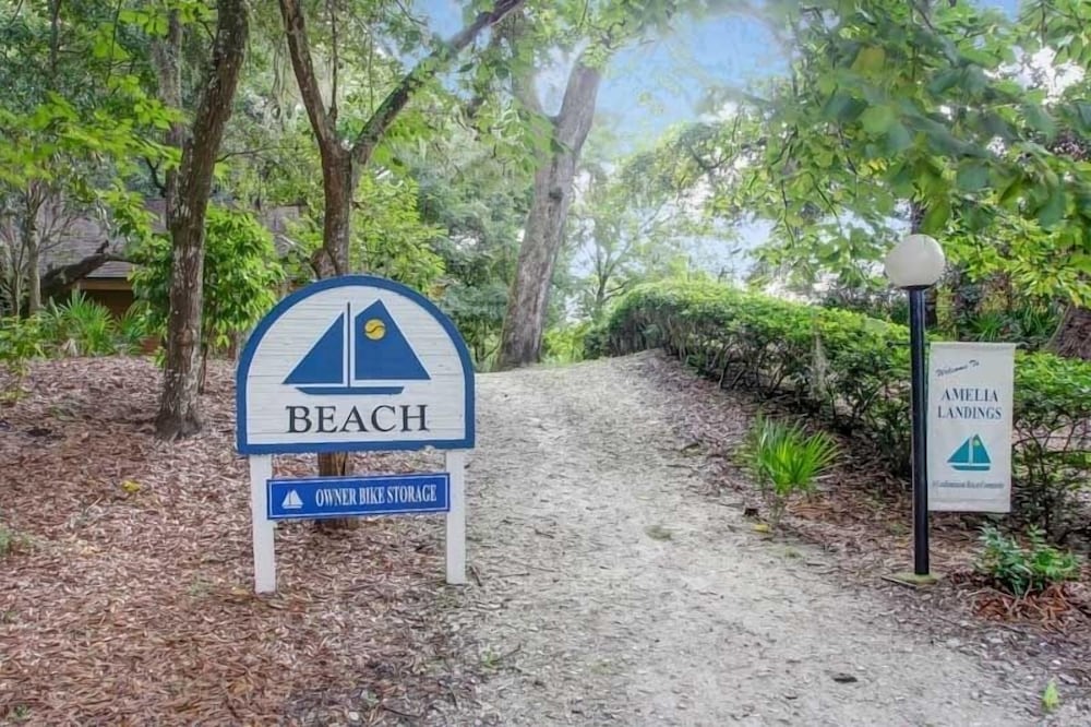 Secluded Condo with Peaceful Wooded Views and Easy Access to the Beach by RedAwning view 4