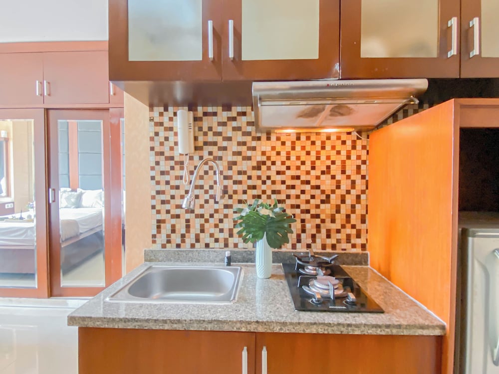 Warm Wood Accents Studio At Mangga Dua Apartment