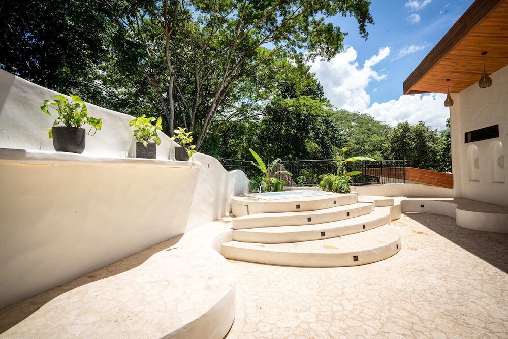Bohemian Tropical Villa with a Tiki-Style Swimming Pool & Swim-Up Bar with an Attached Studio Apartment