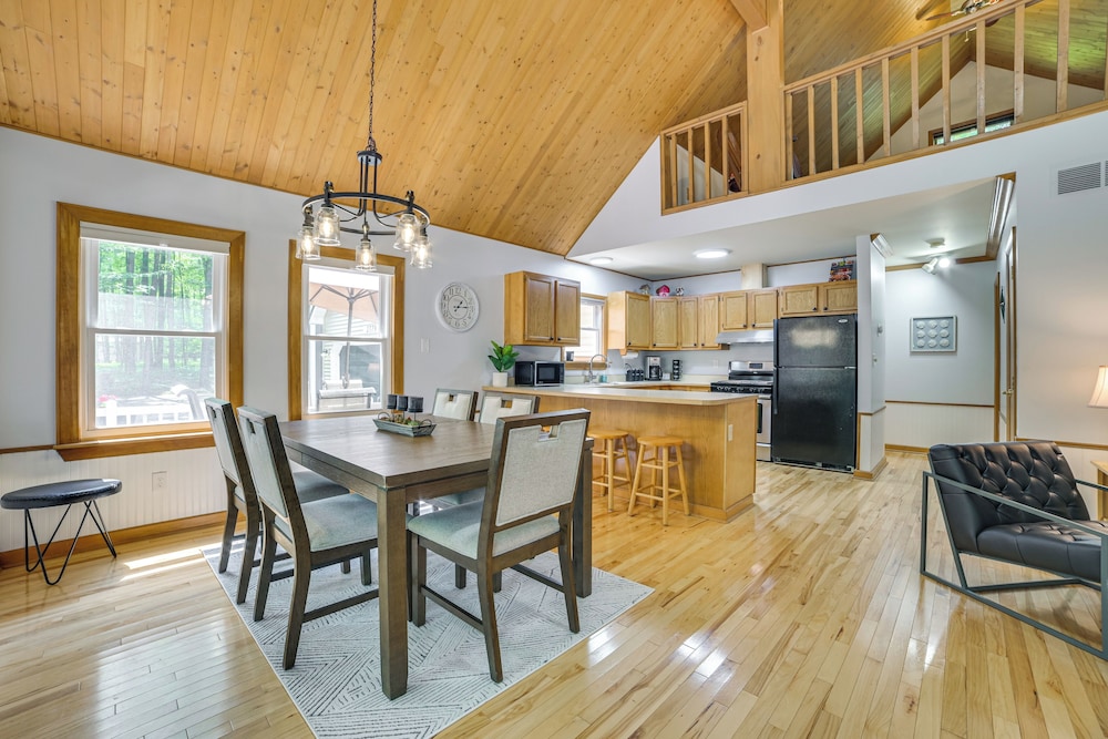 Dock Access + Nearby Beach: Higgins Lake Retreat!