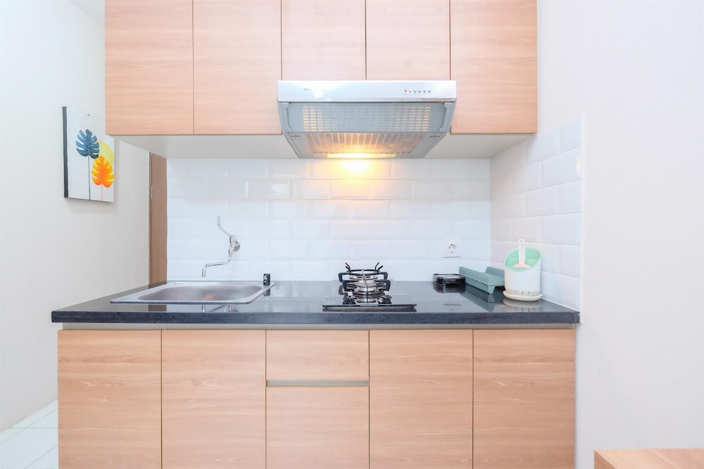 Simply Cozy 2BR Apartment at Podomoro Golf View