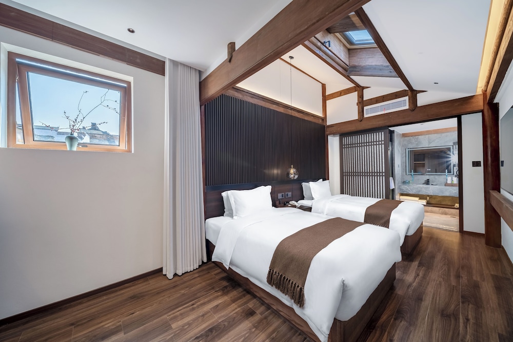 Bajiazhan Yulin Yuchi Homestay