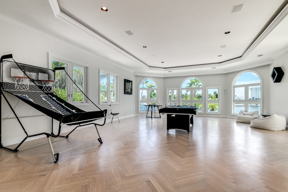Waterfront Mansion With Game Room Gym Media Room and Guest House