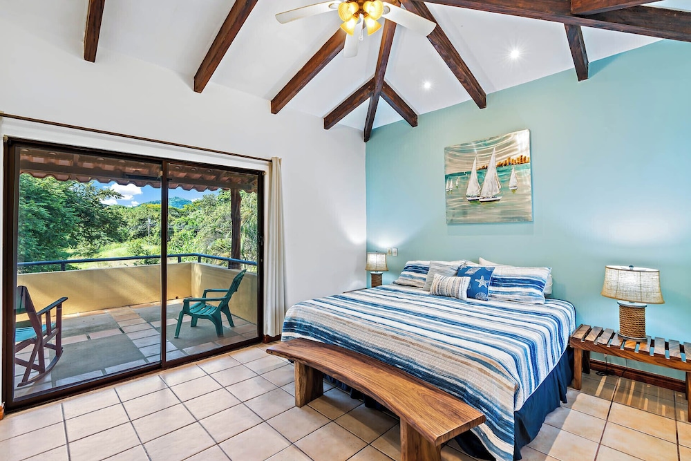 Inviting Home with Colorful Decor and Private Backyard Oasis with a Swimming Pool & Shaded Terrace