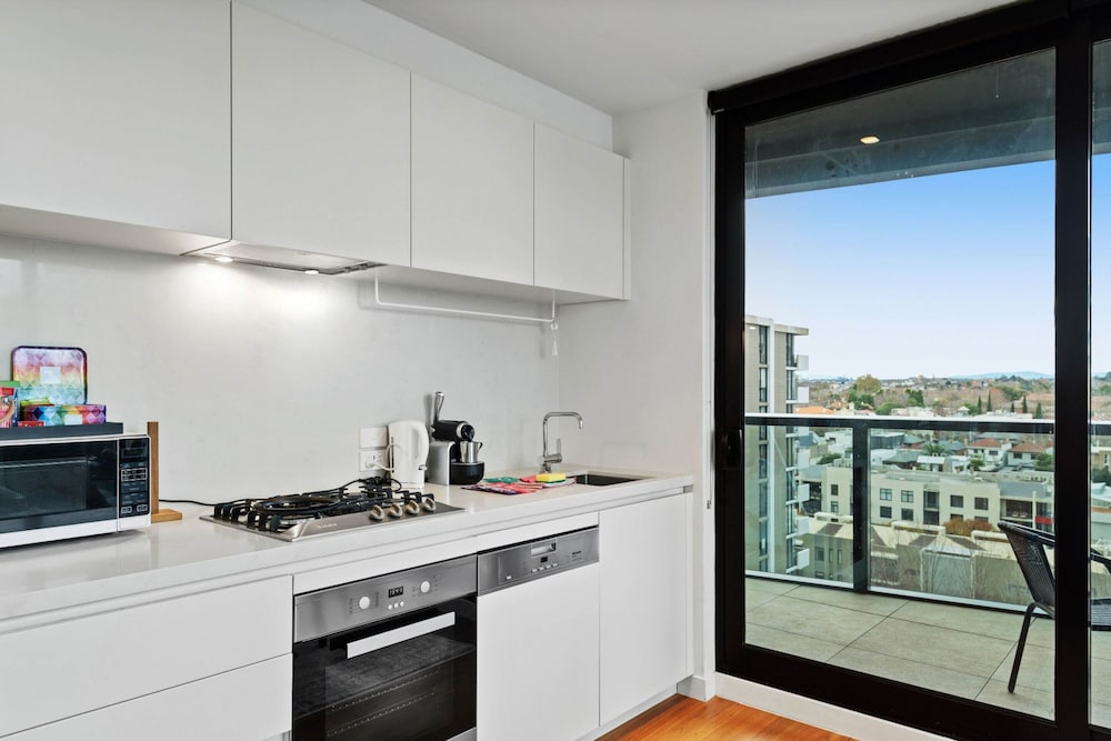 Bright Apartment With City Views in Trendy Locale