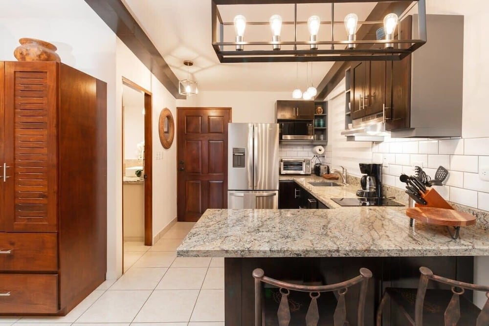 Modern Studio Apartment with Covered Balcony, Full Kitchen, and Stunning Ocean Views