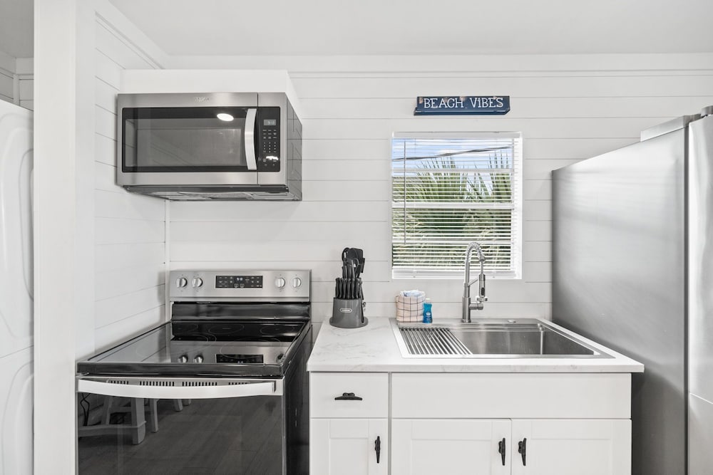 The Beach Bungalow by Book That Condo