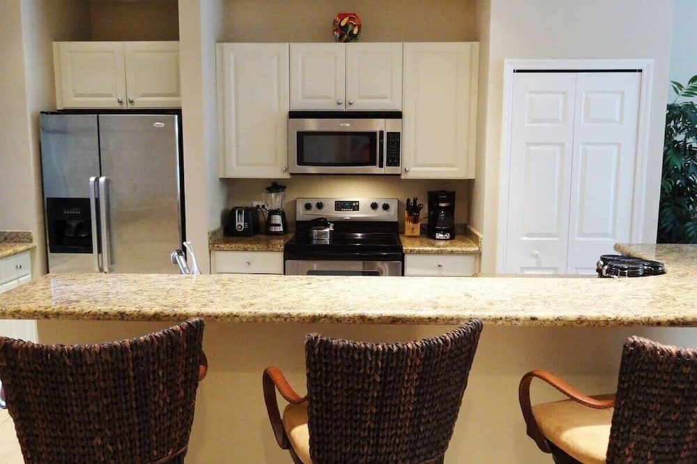 Ground-floor unit in front of lazy river pool at Pacifico in Coco