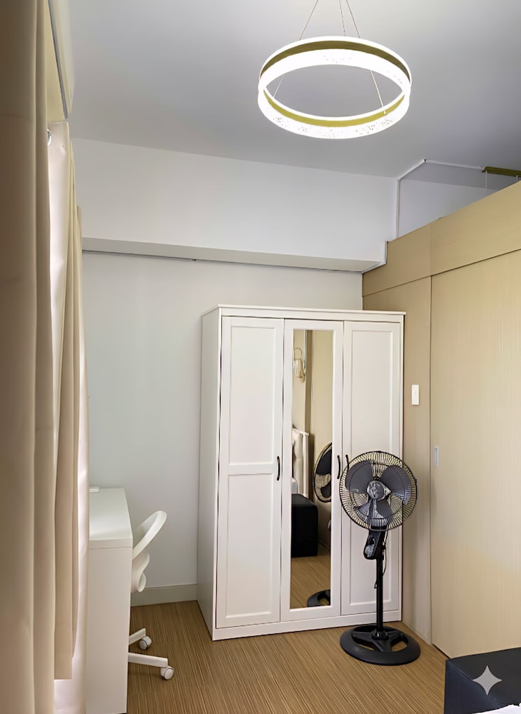 Charm's City Escape at Grace Residences