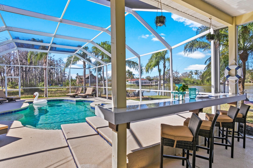 Luxe Waterfront Hideaway w Pool & Pirate Ship Dock