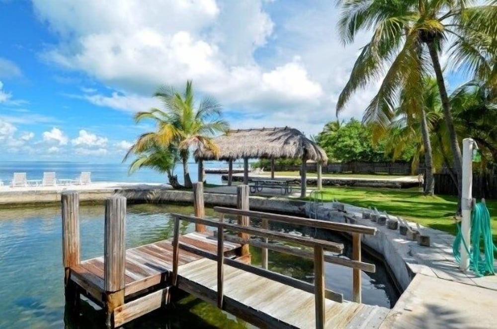Complete Duplex On Gated Bayfront Property 4 Bedroom Apts by RedAwning
