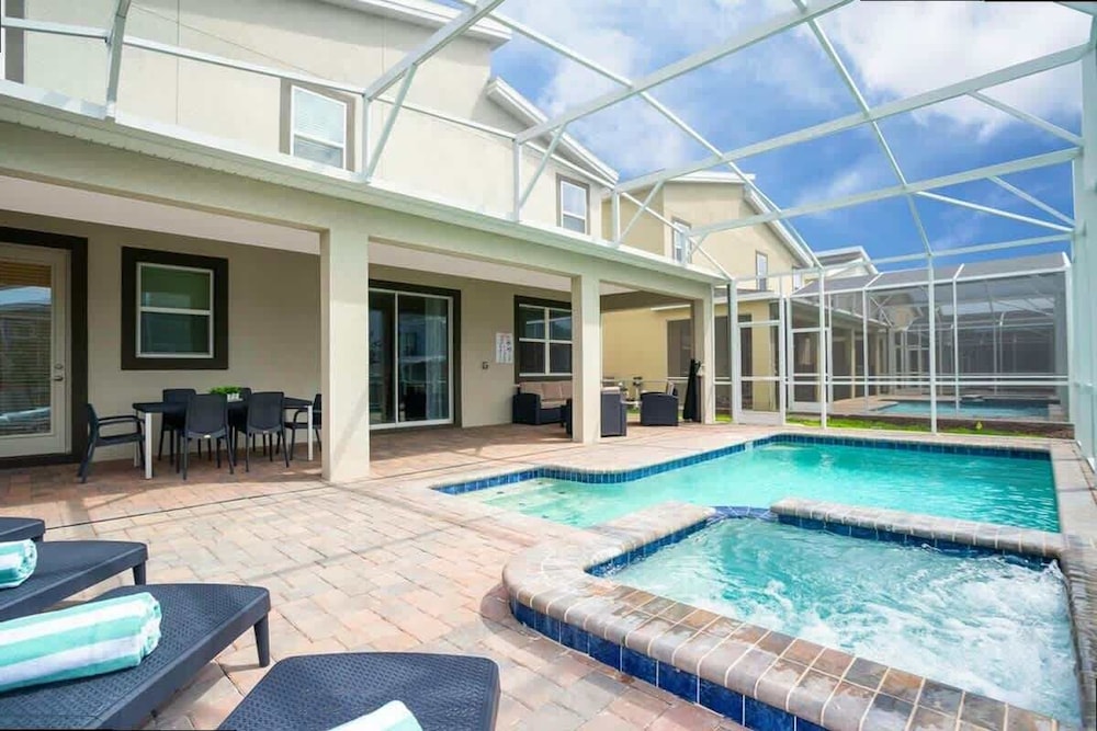 Spacious 7BR w Pool Spa Game Room Near Disney