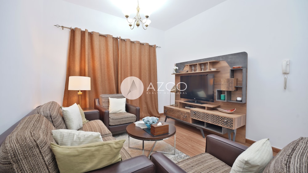 Cozy 1 BHK with City View in JVC by AZCO