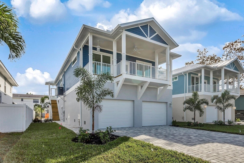 Two, Yes, Two Brand New Homes, Side By Side, Creating The Palace To Fit The Entire Crew. 8 Bedroom Home by RedAwning