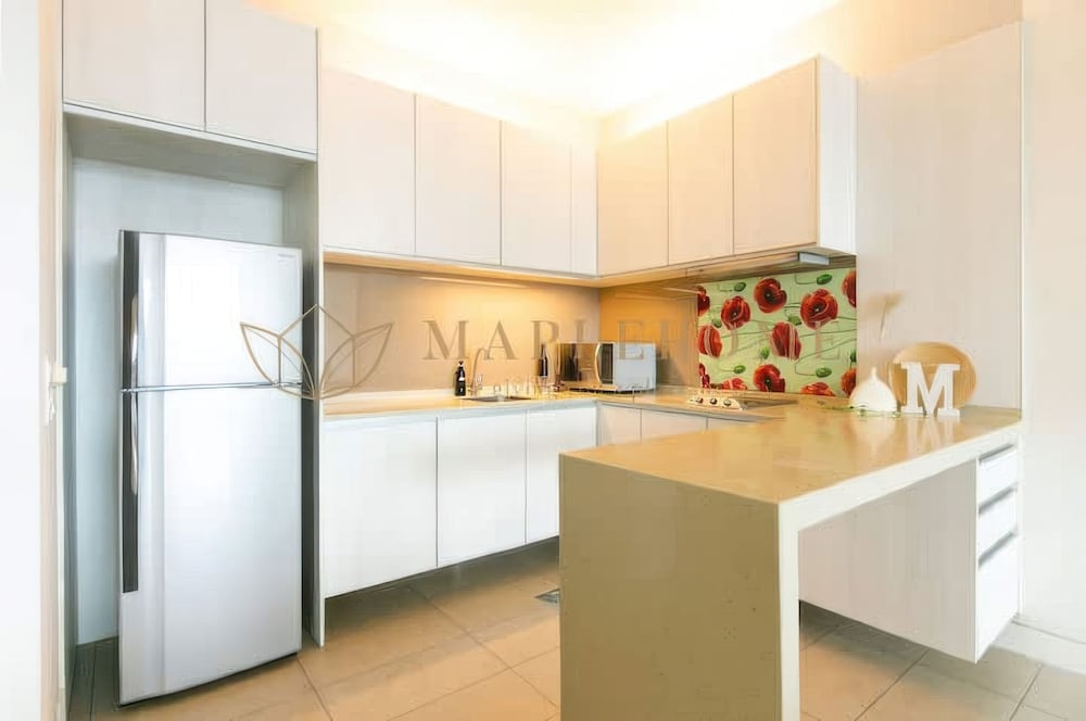 Swiss Garden Residences by Emily