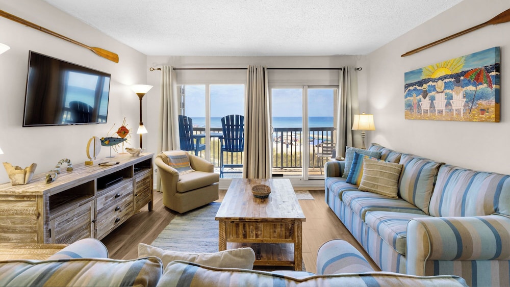 Beachfront Charm Meets Lake Life + Free Tickets: Dolphin Cruise & More!
