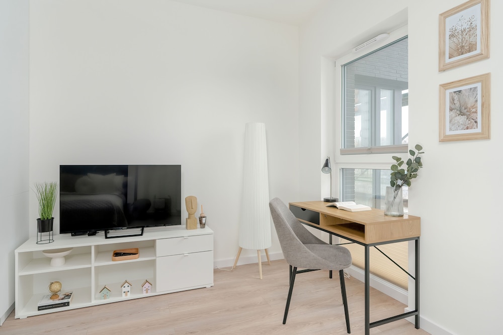 Minimalist Studios in Poznań by Renters