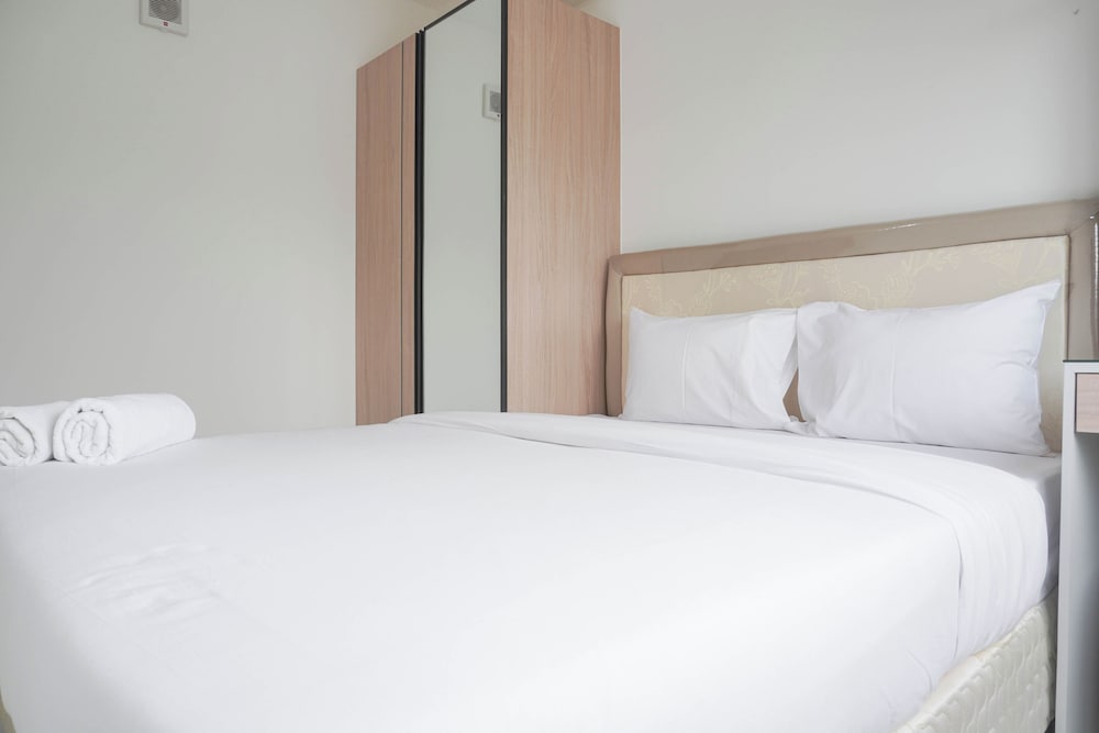 Homey and Minimalist 2BR at Podomoro Golf View Apartment