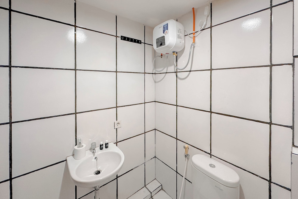 Combined Grey Toned 2Br Apartment At The City Square Surabaya