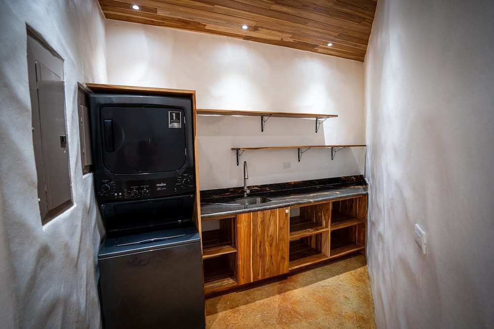 Bohemian Tropical Villa with a Tiki-Style Swimming Pool & Swim-Up Bar with an Attached Studio Apartment