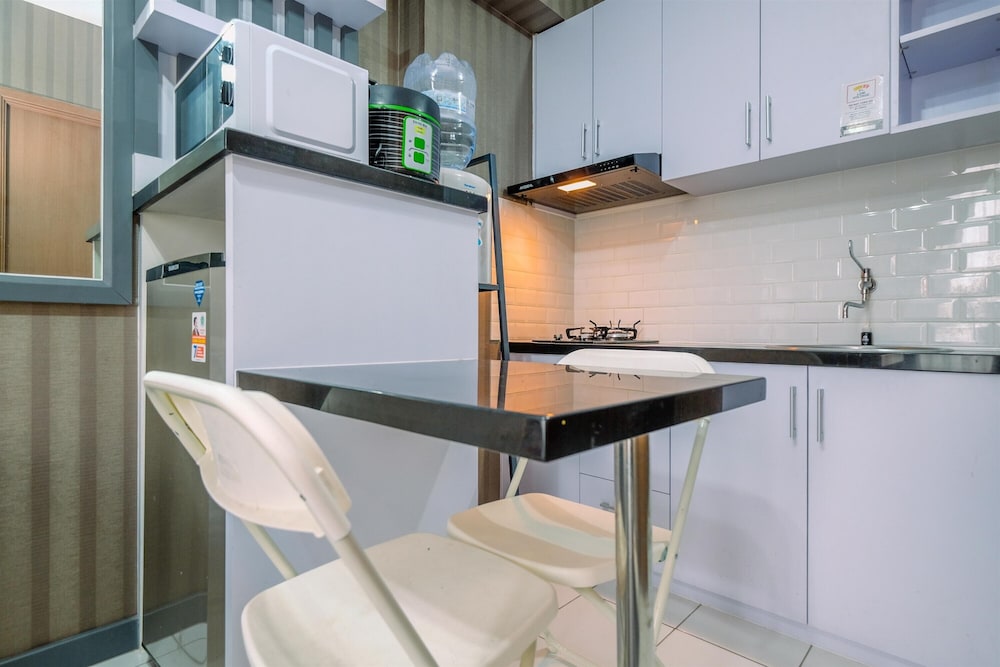 Homey and Cozy Living 2BR Podomoro Golf View Apartment