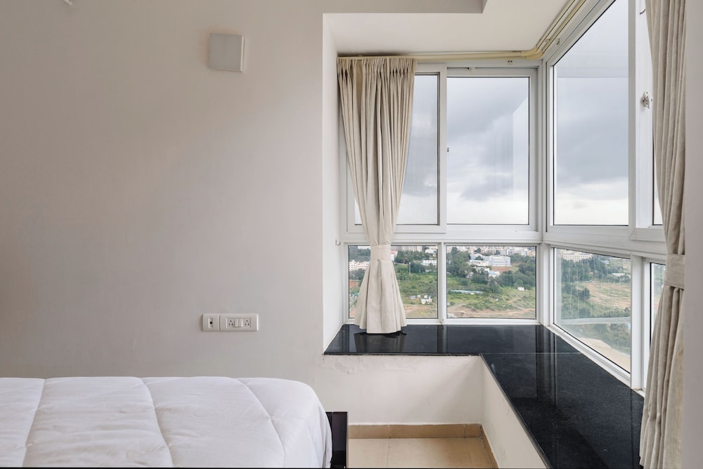Skyline Haven by Red Olive4bhk30mins Airport