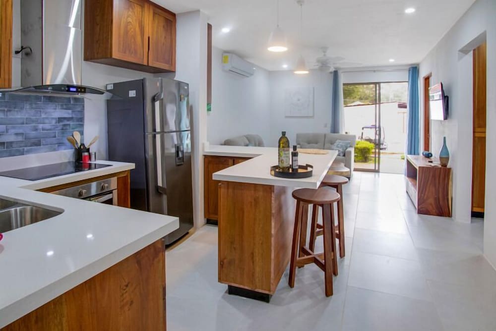 Minimalist Condo with a Beautiful New Design, Enclosed Patio, and Shared Community Pool