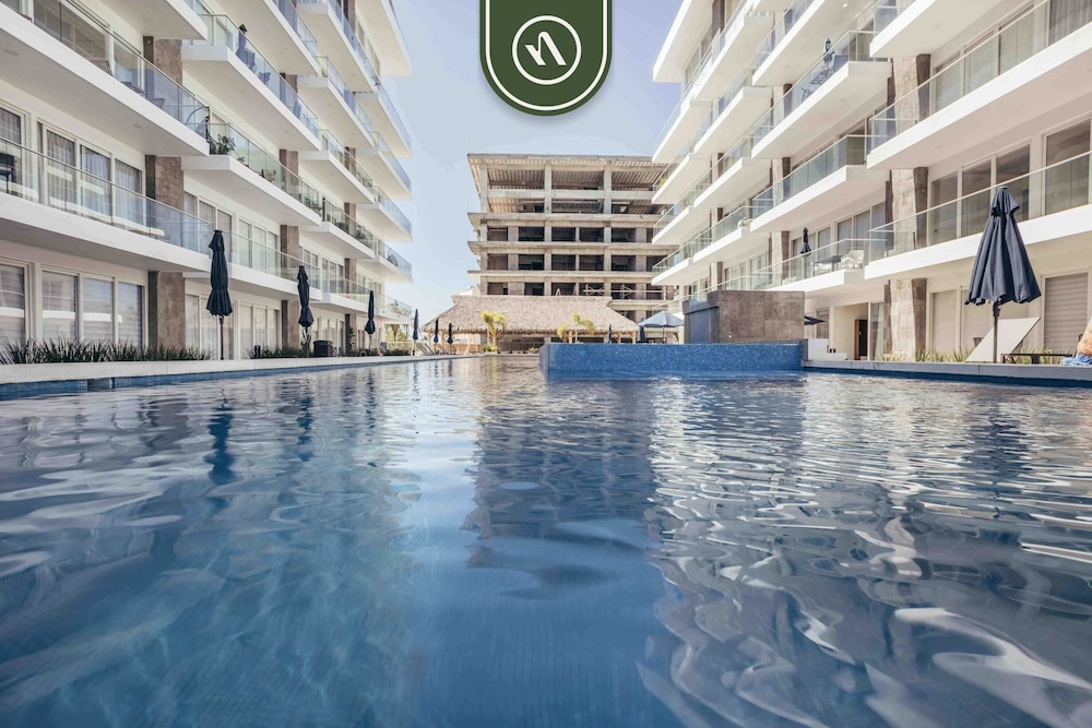 New 2 BR Condo One Street From Beach - Pool - Gym