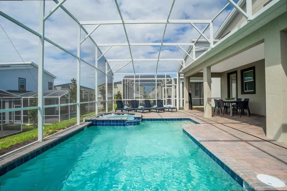 Spacious 7BR w Pool Spa Game Room Near Disney