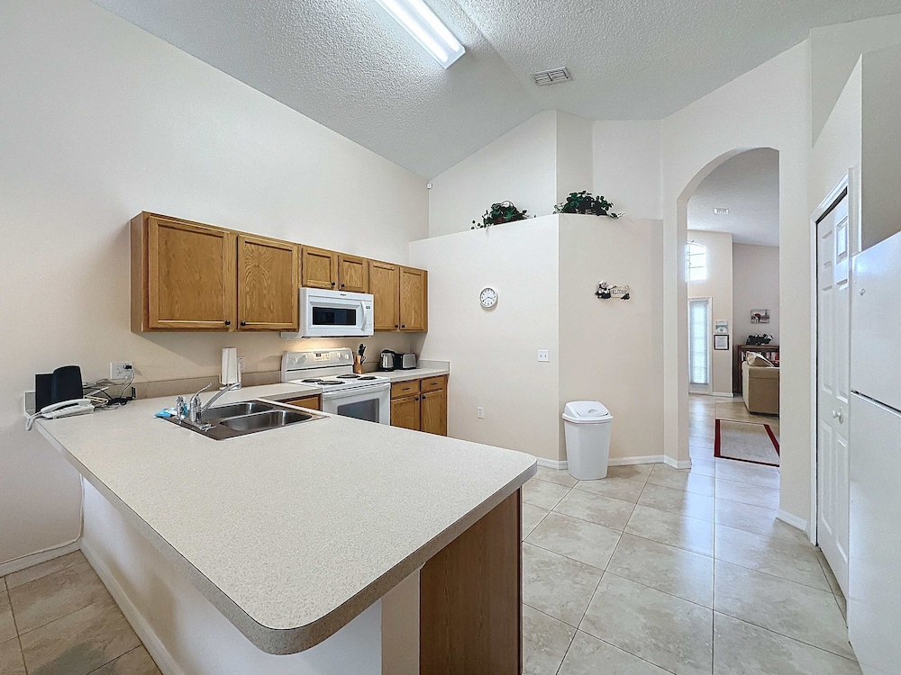 South Facing Pool Home With Golf Course Views