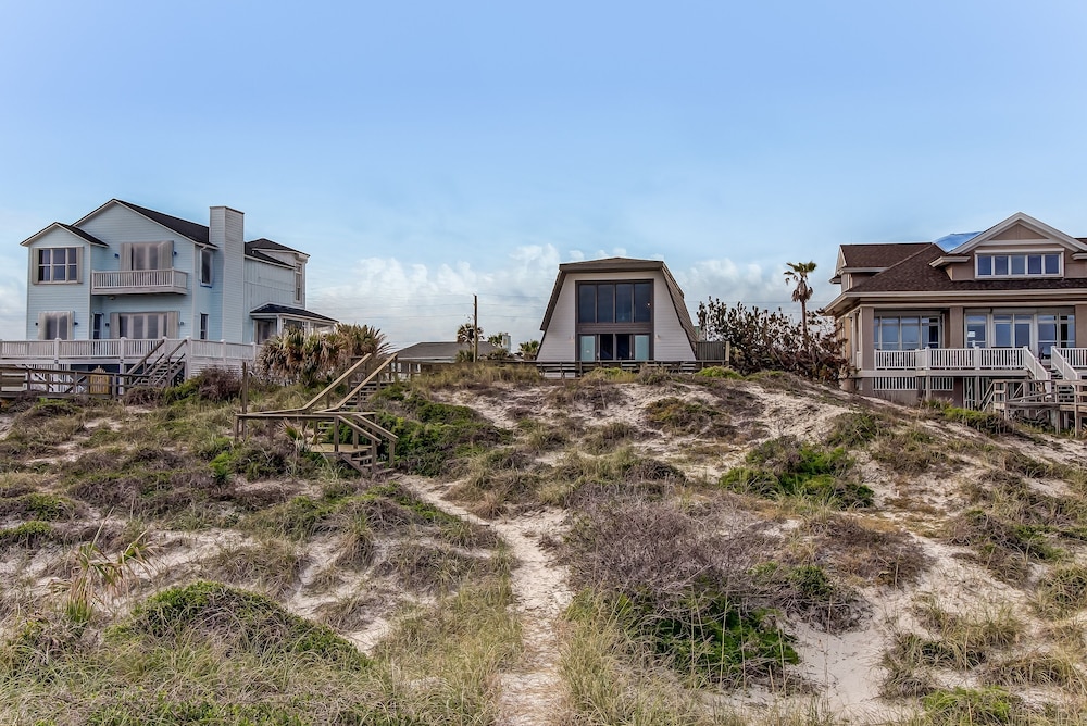 Roomy Chalet-Style Beachfront Condo with Private Beach Access by RedAwning