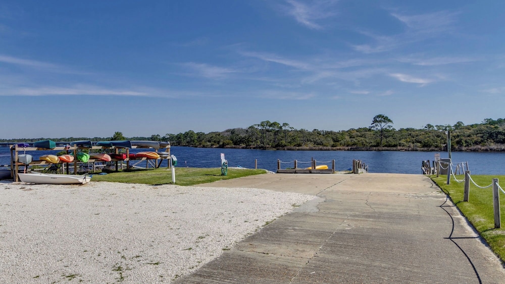 Beachfront Charm Meets Lake Life + Free Tickets: Dolphin Cruise & More!