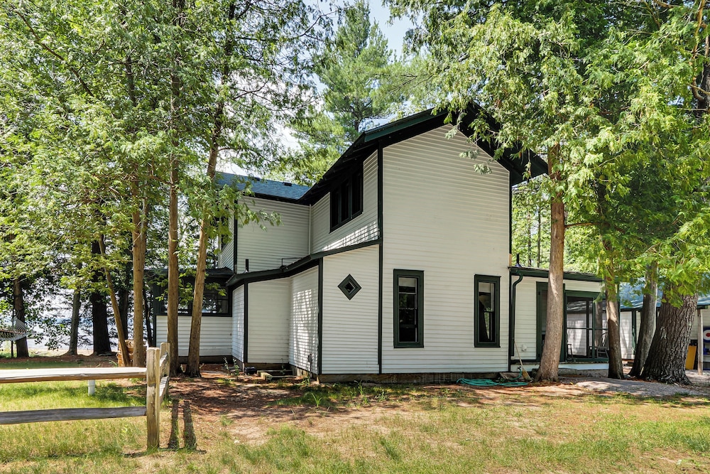 Torch Lake Getaway w/ Private Beach + Boat Dock!