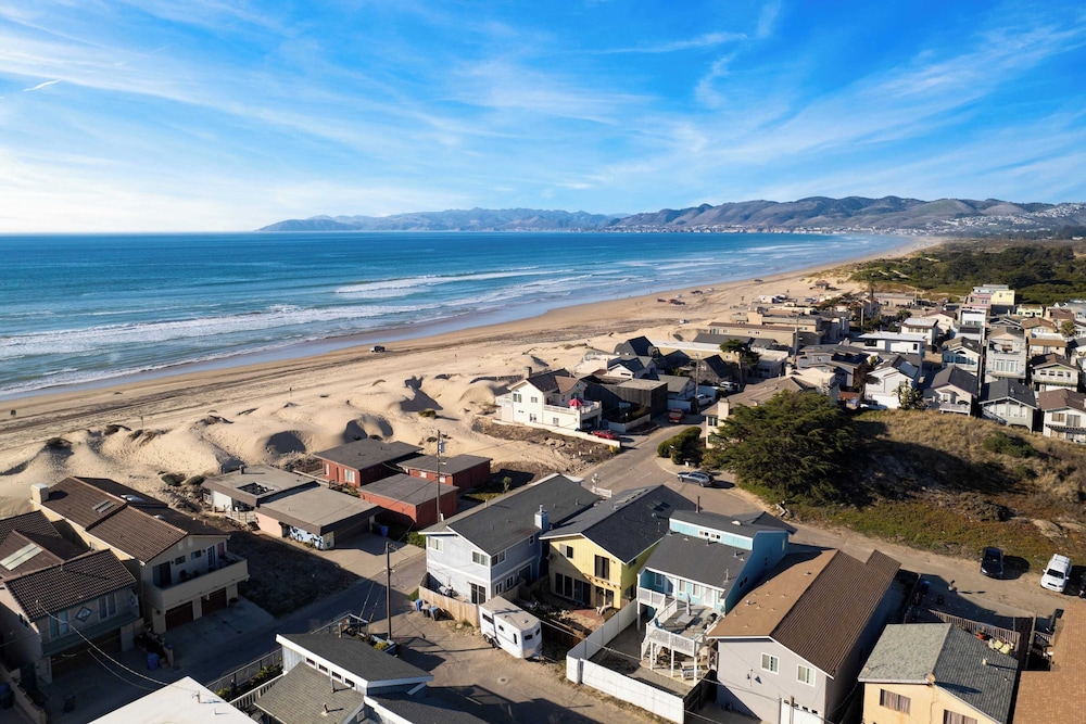 Steps to Beach w/ Patio+deck Foosball Happy Bottom Beach House by Avantstay