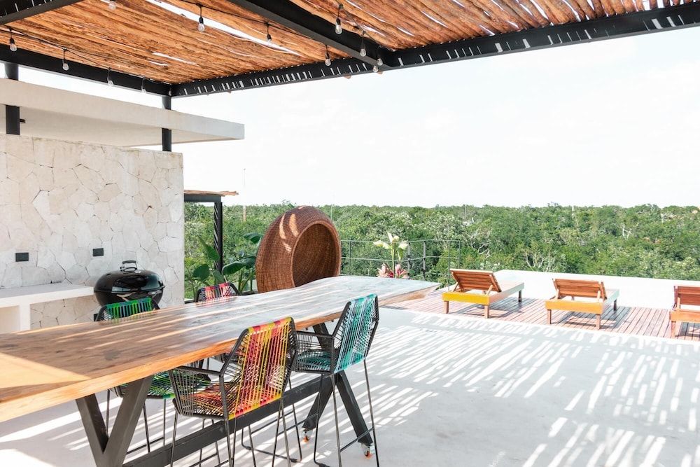 Boho-style Luxury Apartment La Veleta Balcony Rooftop Pool Lounge Area Nice Amenities view 4