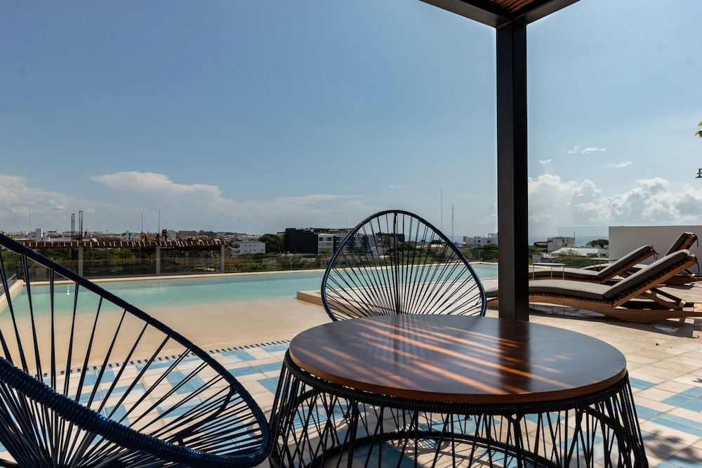 Riva 202 Playa del Carmen Condo Minutes from the Beach and 5th Avenue by RedAwning view 4