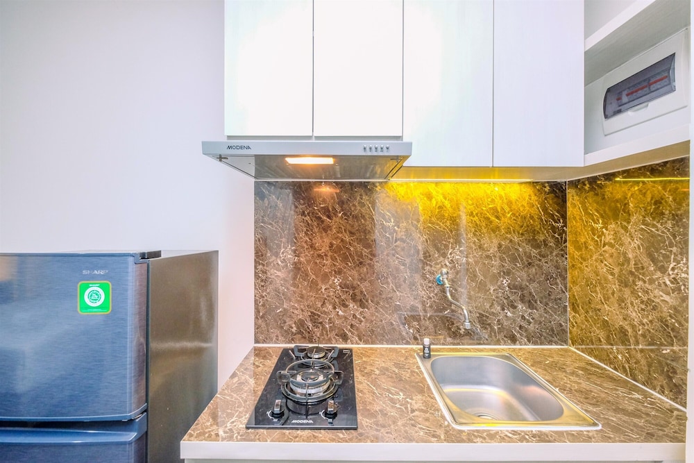 Homey And Restful Studio Lrt City Bekasi Apartment