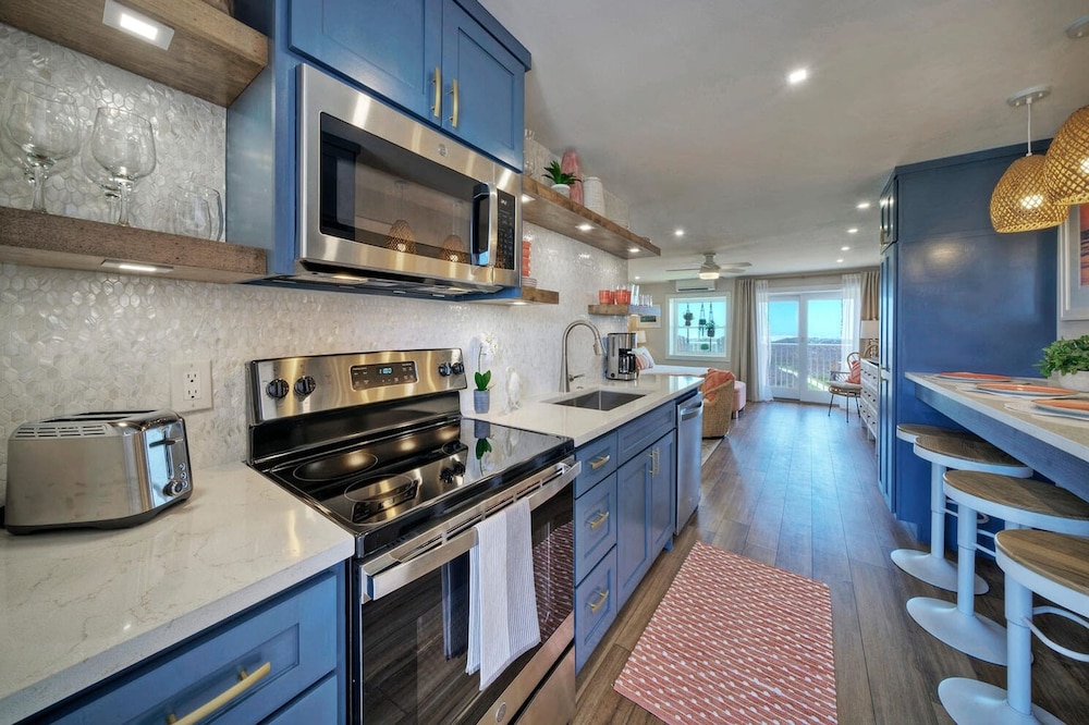 2 Beachfront Condos w Pool Sleeps 8 Beach Happy Summer Love by Avantstay
