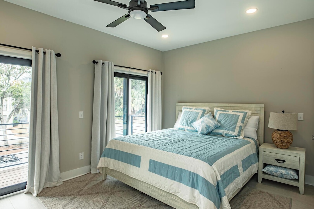 Experience Modern Coastal Living in This Beautifully Designed 4-bed, 4-bath Home