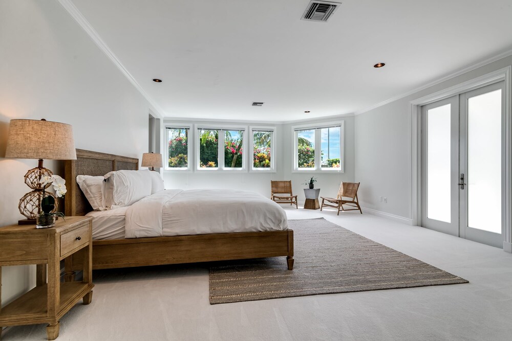 Waterfront Mansion With Game Room Gym Media Room and Guest House