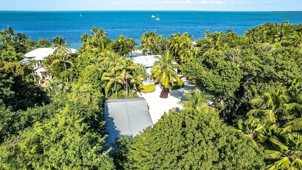 Lush Tropical Plantings In A Gated Compound Located Directly On The Florida Bay 1 Bedroom Cottage by RedAwning view 5