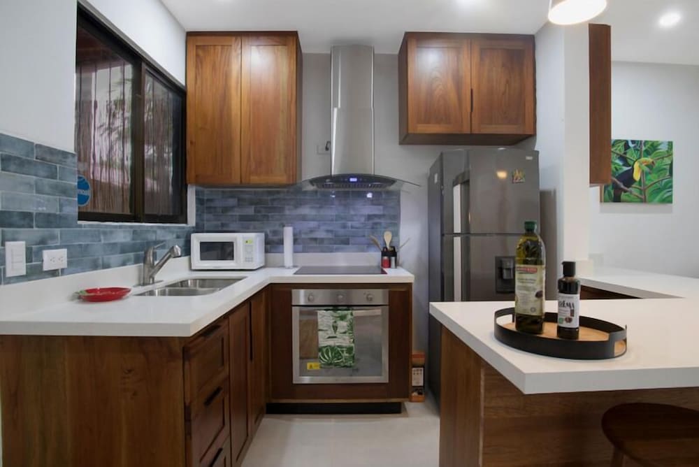 Minimalist Condo with a Beautiful New Design, Enclosed Patio, and Shared Community Pool