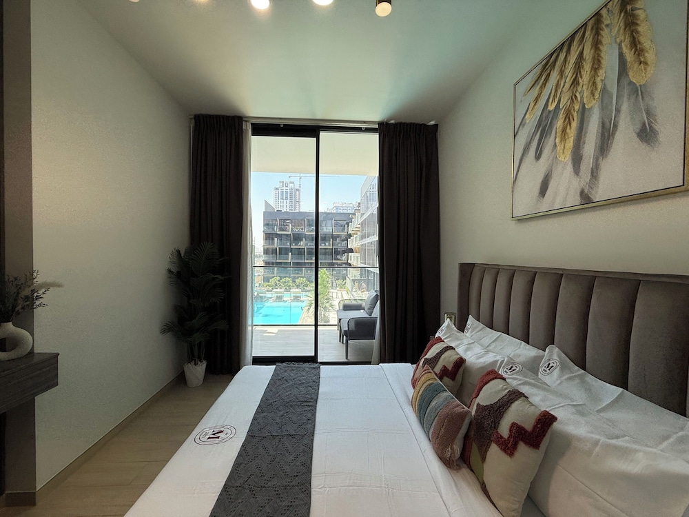 Manzil-1BR in JVC with Pool View