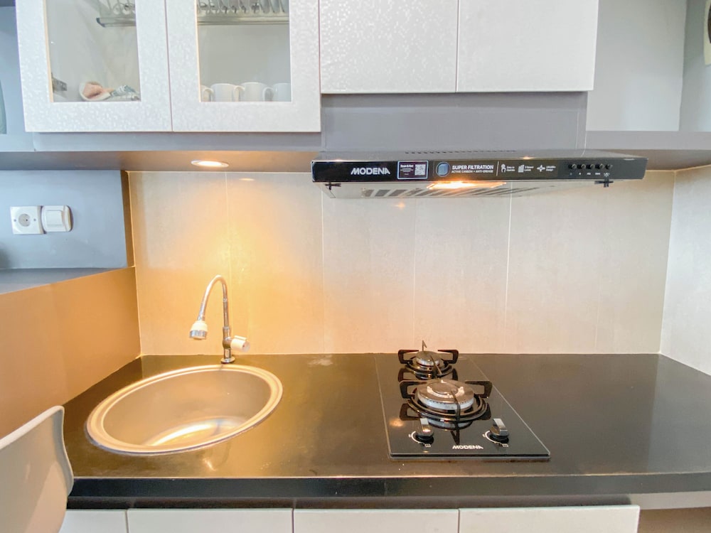 Homey And Modern 2Br At Patraland Urbano Apartment