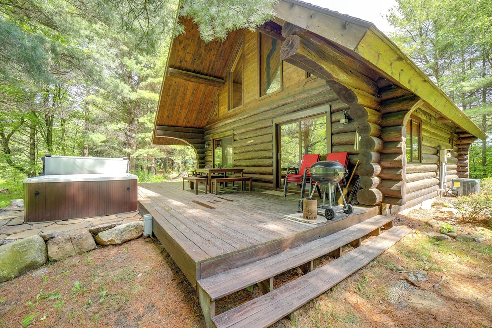 Secluded Log Cabin in NW Michigan: Hot Tub Deck - Property Image 8