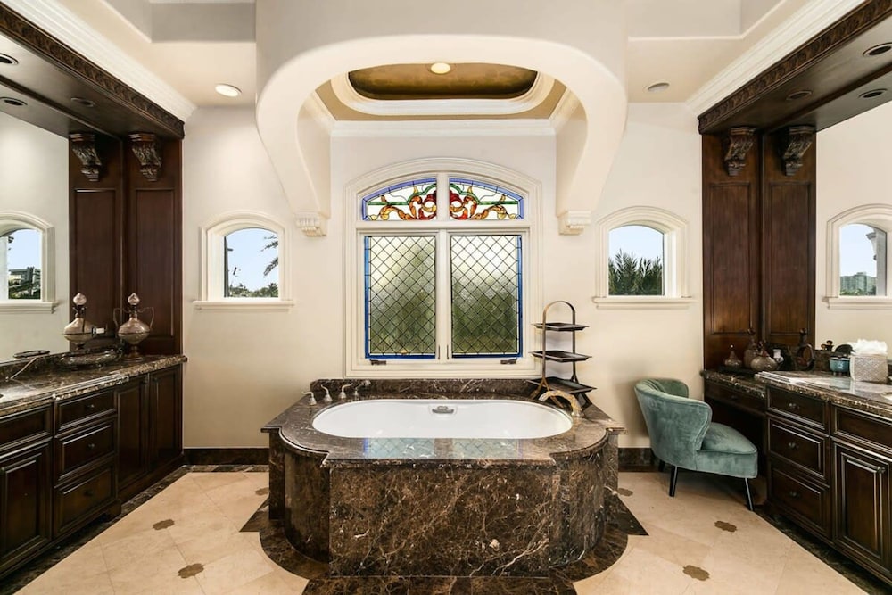 Luxurious 3-story Estate With Gym Pool Slide Private Beach and Lighthouse Views