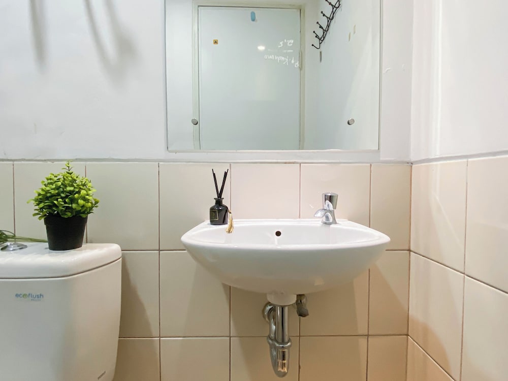 Basic Studio Room At Azalea Suites Apartment