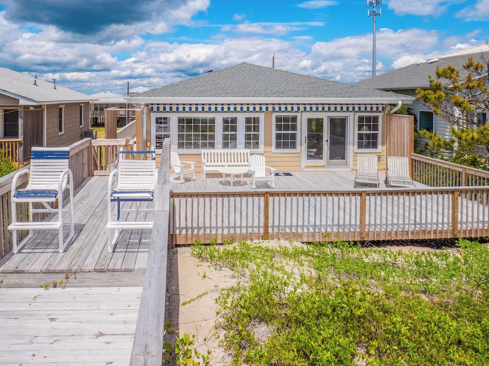 A Charm of Finches by Topsail Realty
